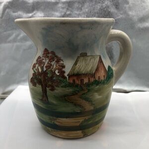 R.P.R. Co. Roseville Rustic Cottage Scene Ceramic Pitcher